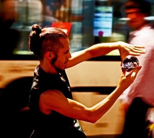 'German' contact juggling photo by Jorge Gera